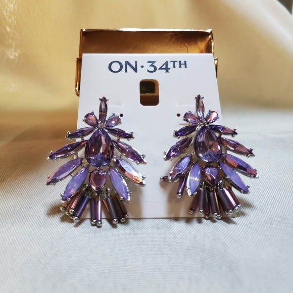 On 34th purple rhinestone post earings. - Picture 2 of 3